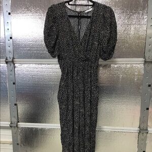 Calista Jumpsuit with pockets. Size Medium.